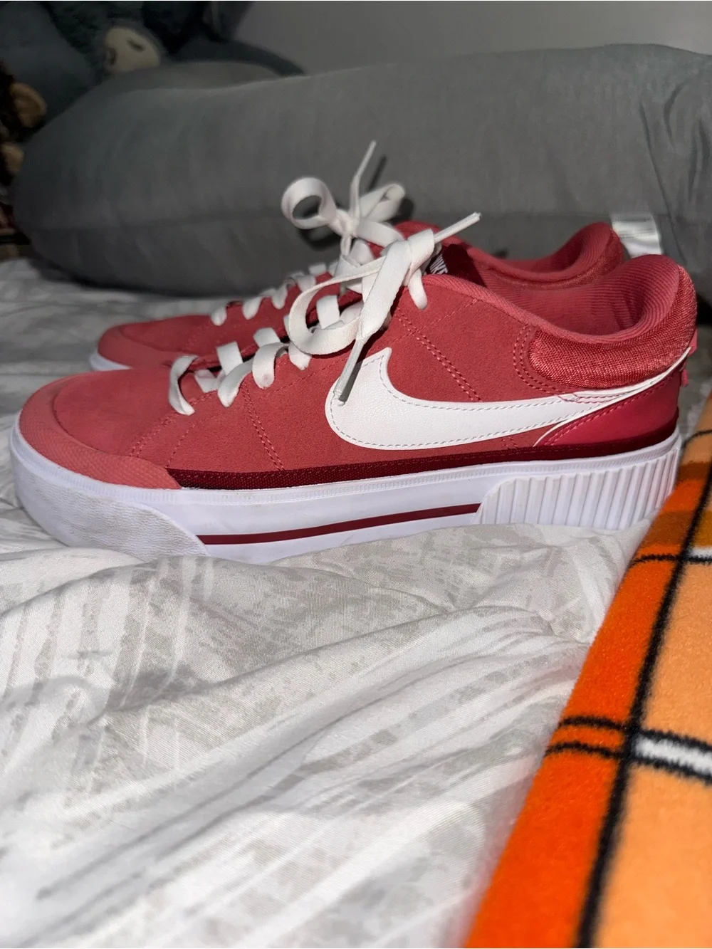 Nike Women’s Rose Pink Suede Sneakers with White Swoosh